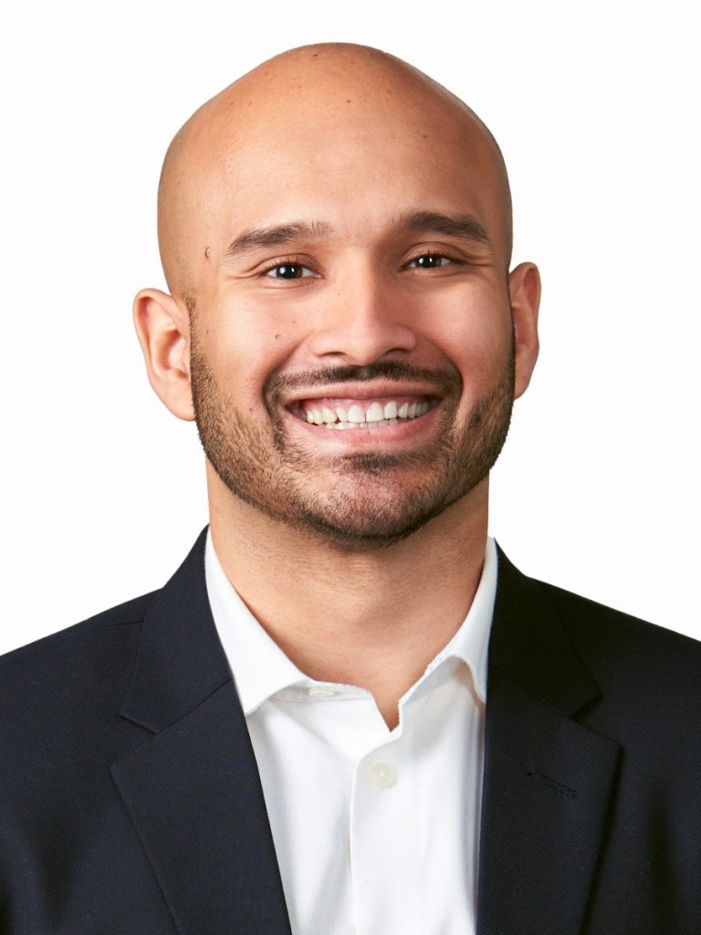 Professional portrait of a male financial advisor in Midtown Manhattan