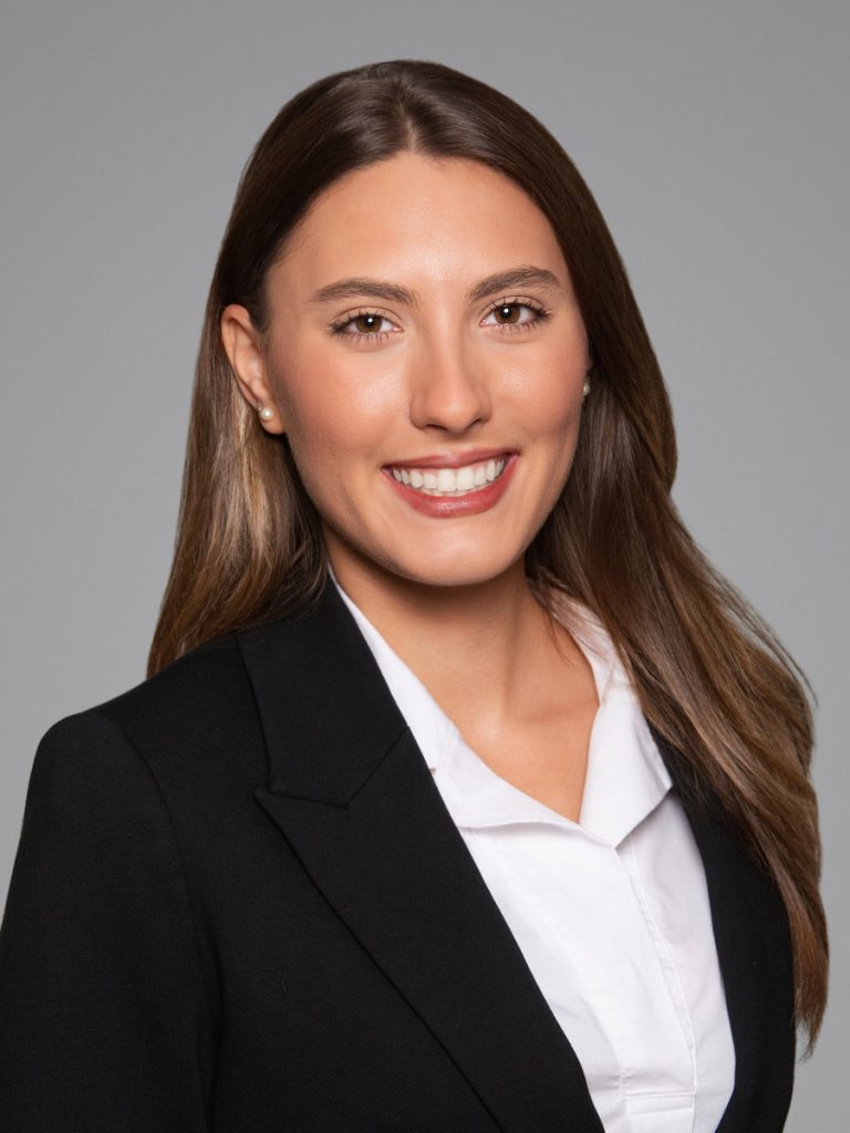 A female financial advisor headshot nyc against a light background